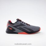 أسود أساسي / رمادي نقي 5 / توهج برتقالي حذاء تدريب نانو x1 للرجال Reebok 0NZ0F1044 - Image 2