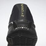 أسود أساسي / رمادي نقي 7 / ذهبي غير لامع حذاء تدريب نانو x2 للرجال Reebok 0NZ0F1338 - Image 11