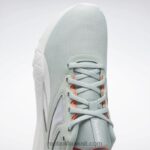 الرمادي الساحلي / أبيض ftwr / البرتقالي التوهج حذاء فلكساغون إنرجي 4 للتدريب النسائي Reebok 0NZ0F184 - Image 8