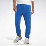 رجال ناقلات الأزرق / الأبيض عداء ببطء الهوية Reebok 0NZ0F1188
