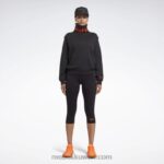 نحيف أسود / برتقالي ألتيما فيكتوريا بيكهام الطربوش الطربوش البلوز الرقبة Reebok 0NZ0F401