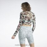 نحيف حكيم خفيف قميص شبكي بأكمام طويلة وطبعة أزهار كلاسيكية Reebok 0NZ0F750 - Image 3
