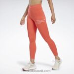 نحيف مضيئة شبه برتقالية تشغيل طماق ناقلات Reebok 0NZ0F562